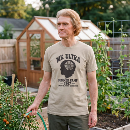 Thomas Jefferson wearing the MK Ultra Summer Camp t-shirt in sand