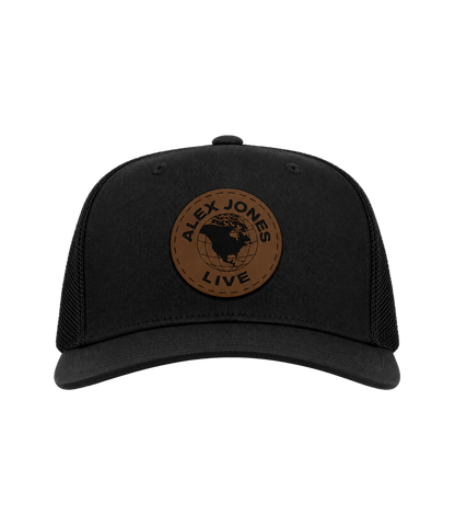 The Alex Jones Store - Black trucker hat with brown leather circle patch featuring 'Alex Jones Live' globe logo, front view