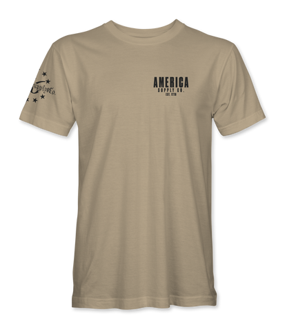The Alex Jones Store - Front of tan America Supply Co Hunting Dog t-shirt with small left-chest America Supply Co Est. 1776 logo