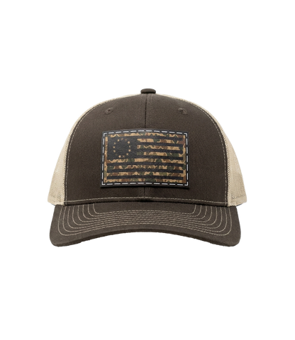 The Alex Jones Store - Betsy Ross Camo Flag Leather Patch Trucker Hat - front
