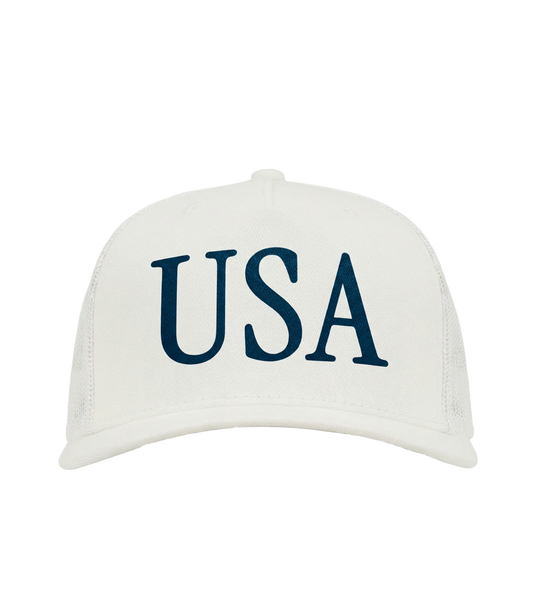 The Alex Jones Store - White 'USA' Premium Trucker Hat with navy serif USA lettering on structured front panel, front view