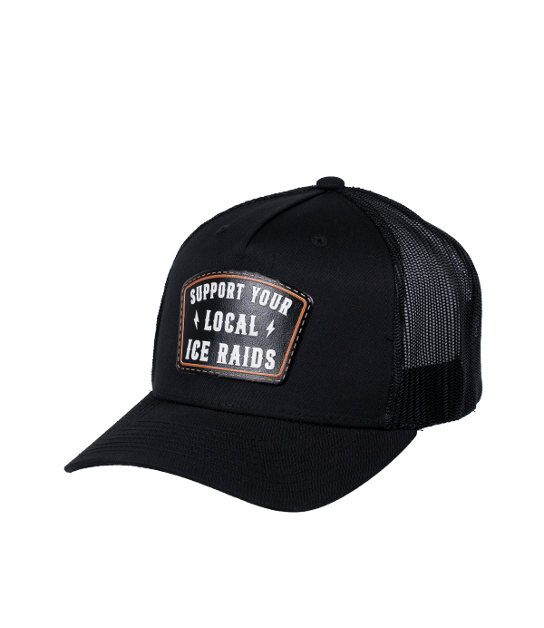 The Alex Jones Store - Black trucker hat three-quarter view with 'Support Your Local ICE Raids' leather patch on front and mesh back