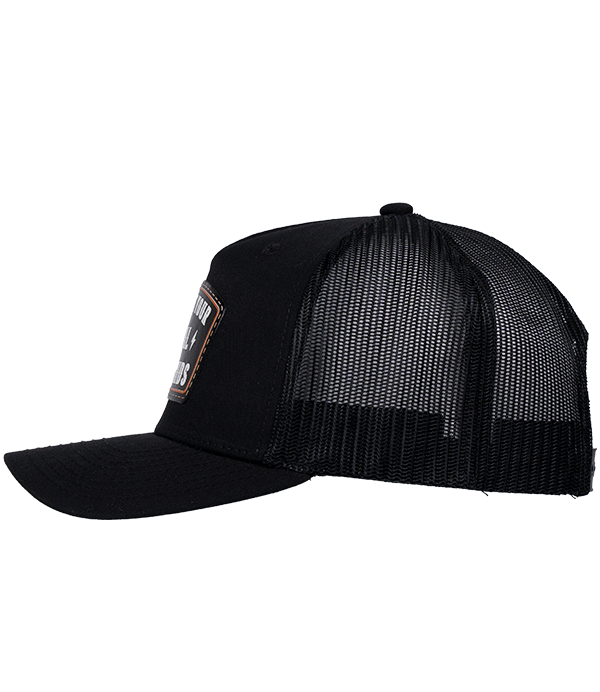 The Alex Jones Store - Support Your Local ICE Raid Trucker Patch Hat — Black trucker patch hat left side view with mesh back panels and partial ICE Raids leather patch visible