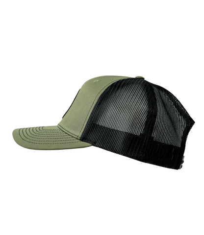 The Alex Jones Store - "You Shall Conquer" Leather Patch Hat — Left side profile of olive green trucker hat with curved brim and black mesh back ventilation