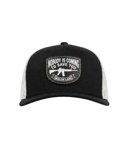 The Alex Jones Store - Front of black and white Nobody Is Coming To Save You trucker hat with stitched Molon Labe rifle patch on black front panel and white mesh back
